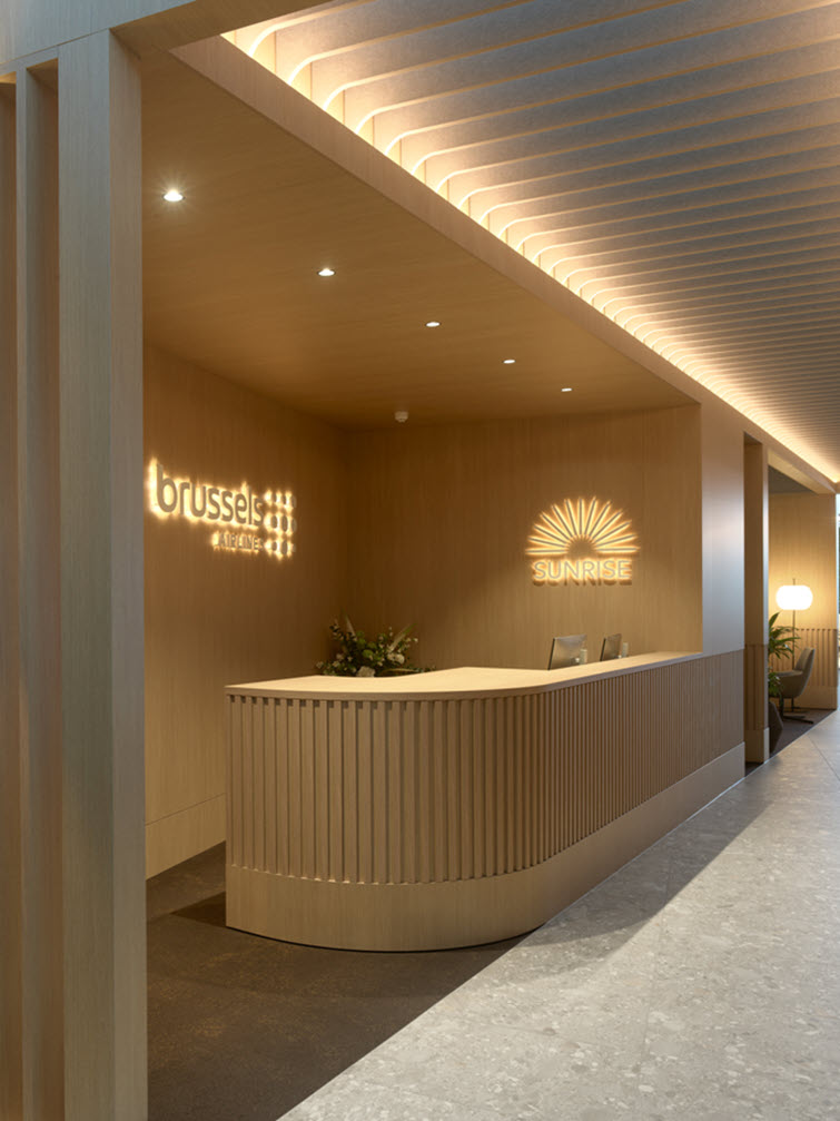 Sunrise Lounge renovation featuring HPL by Unilin Panels transports travelers to warmer destinations